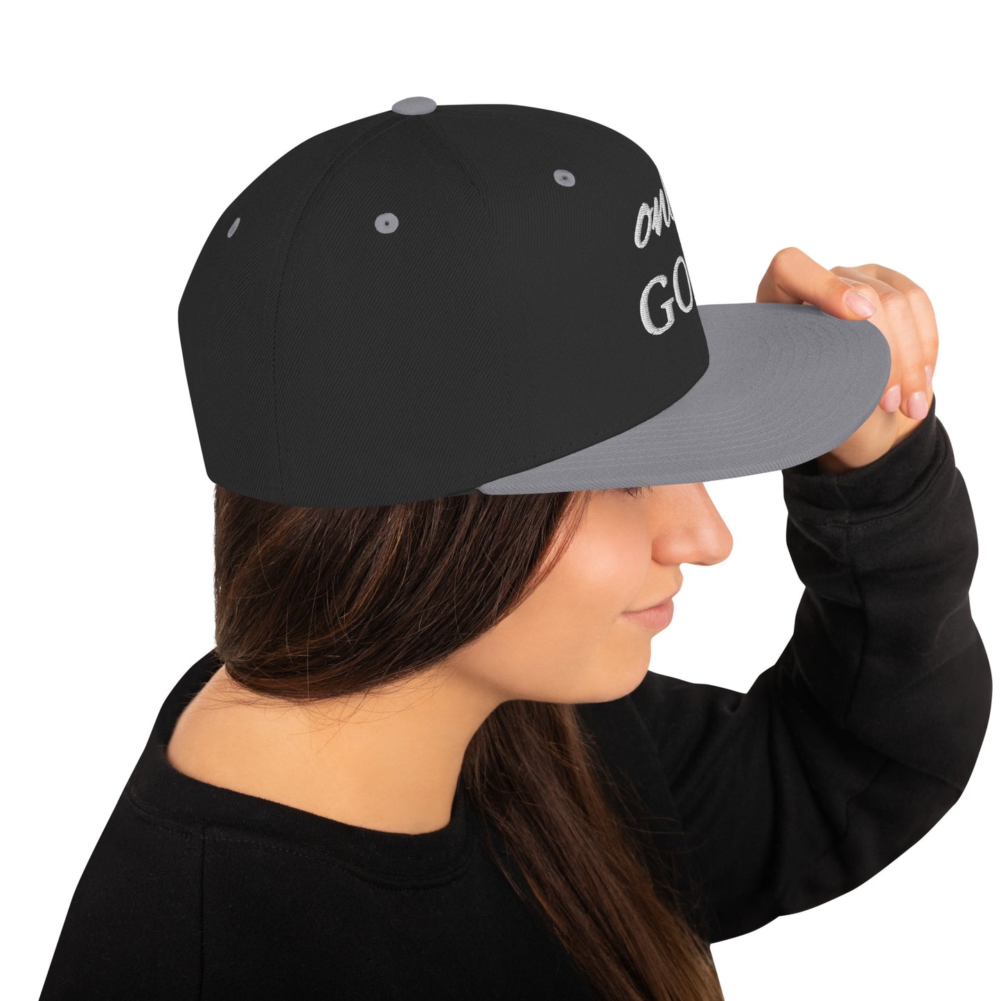 "Traditional snapback cap with a timeless design for any look.